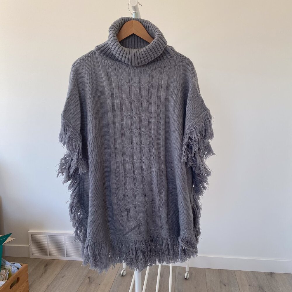 Poncho with fringe